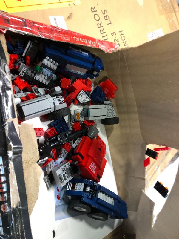 Photo 4 of LEGO Icons Optimus Prime 10302 Transformers Figure Set, Collectible Transforming 2-in-1 Robot and Truck Model Building Kit for Adults, Perfect for Display or Play Standard Packaging