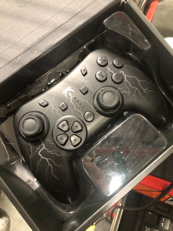 Photo 3 of ***not exact***
Switch Controller, Wireless Switch Pro Controller for Switch/Switch Lite/Switch OLED, RGB Adjustable LED Wireless Remote Gamepad with Unique Crack/Motion control/Turbo/ALPS Joystick (Black)
