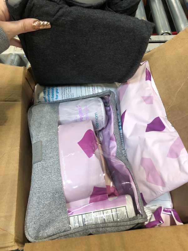 Photo 2 of Frida Mom Hospital Packing Kit for Labor, Delivery, & Postpartum | Nursing Gown, Socks, Peri Bottle, Disposable Underwear, Ice Maxi Pads, Pad Liners, Perineal Foam, Toiletry Bag, 15 Piece Set