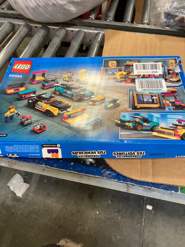 Photo 2 of ** FOR PARTS** LEGO City Custom Car Garage 60389, Toy Garage Building Set with 2 Cutomizable Cars, Pretend Play Mechanic Toy with 4 Mini Figures, for Boys and Girls Ages 6 and Up or Kids Who Love Cars Standard Packaging