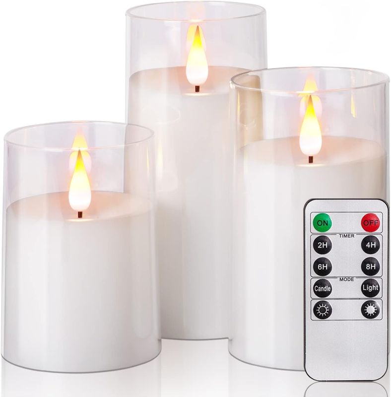 Photo 1 of Amagic Acrylic Flameless Candles, Battery Operated Candles, Flickering LED Pillar Candles with Remote Control and Timer, Yellow and Blue Glow, Set of 3
