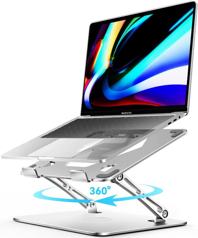 Photo 1 of ivoler Adjustable Laptop Stand with 360° Rotating Base, Ergonomic Laptop Stand for Desk, Foldable & Portable Laptop Riser, Suitable for Collaborative Work, Fit MacBook Laptops up to 16 inches[Silver]
