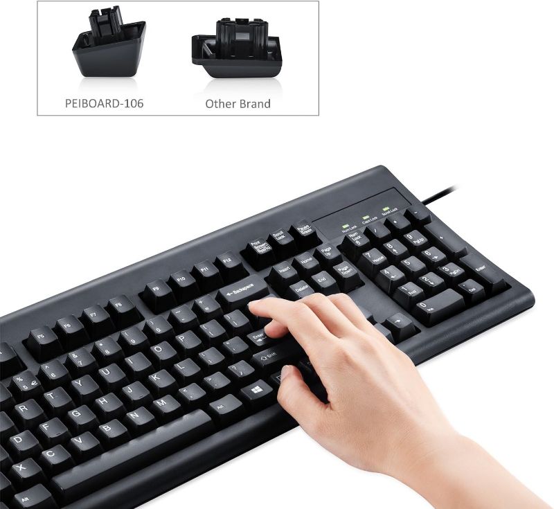 Photo 1 of Perixx Periboard-106, Wired Performance Full Size Keyboard, Curve Ergonomic Keys, Black, US English Layout (11204)