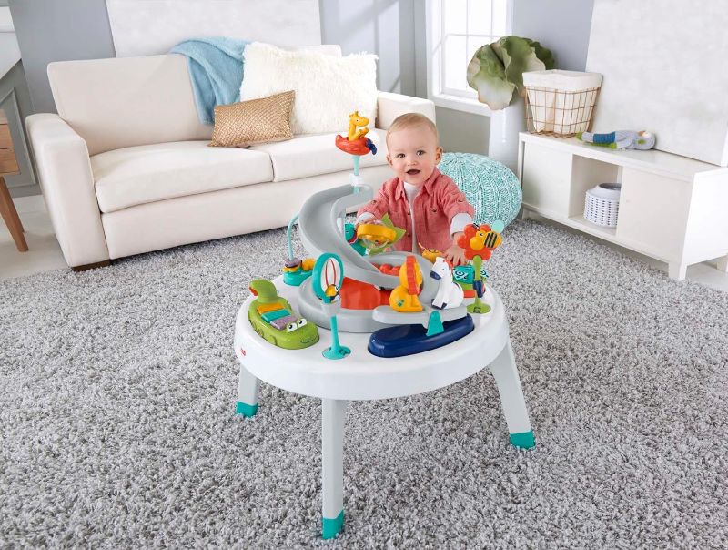 Photo 1 of Fisher-Price 2-in-1 Baby Activity Center and Toddler Activity Table Racing Ramp with Lights and Music, Spin ‘n Play Safari