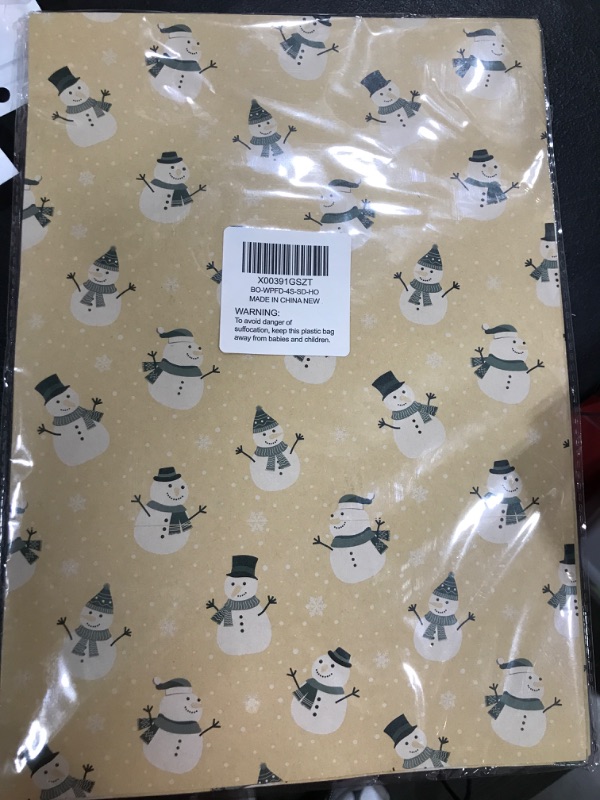 Photo 1 of BIOBROWN Kraft Christmas Wrapping Paper Sheet with Gift Tags Kraft Wrapping Paper for Christmas Folded Flat 27.5 inch X 39.4 inch per Sheet Total 4 Large Sheets Snowman