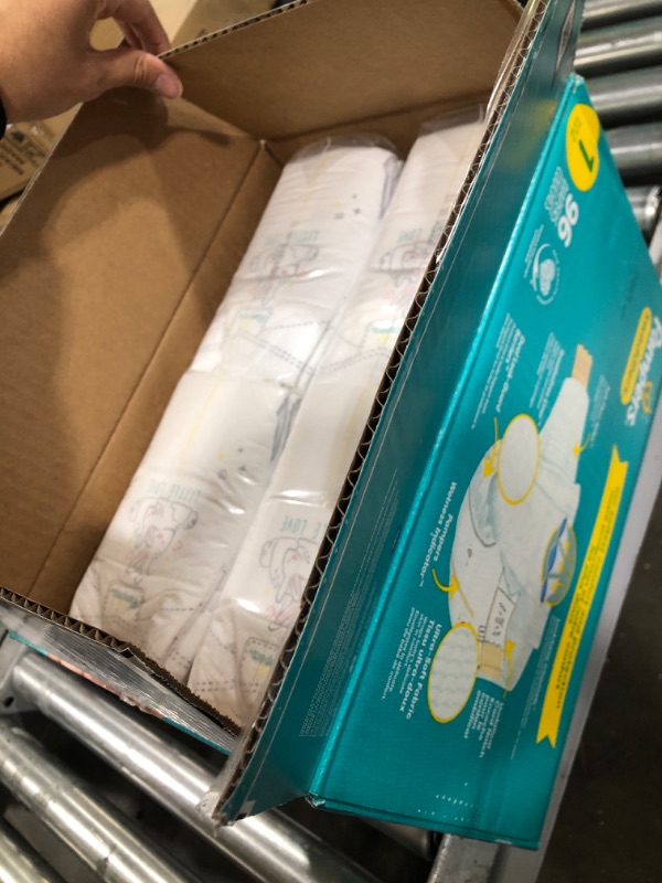 Photo 2 of Diapers Newborn/Size 1 (8-14 lb), 96 Count - Pampers Swaddlers Disposable Baby Diapers, Super Pack (Packaging May Vary) 96 Count (Pack of 1)