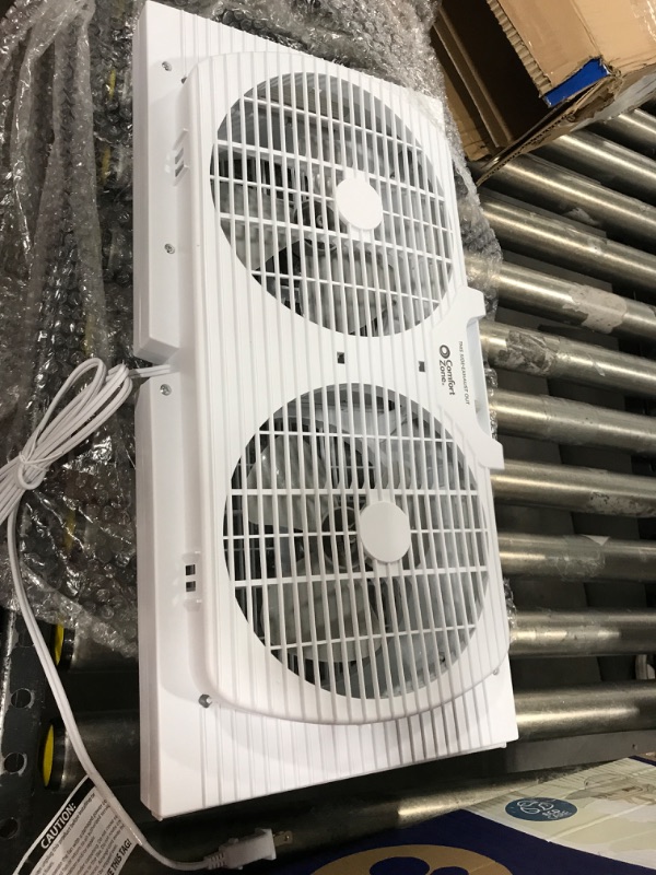 Photo 2 of Comfort Zone CZ319WT2 9" Twin Window Fan with Reversible Airflow Control, Auto-Locking Expanders and 3-Speed Fan Switch with Quiet Setting, White 9" Twin Window Fan w/ Quiet Speed