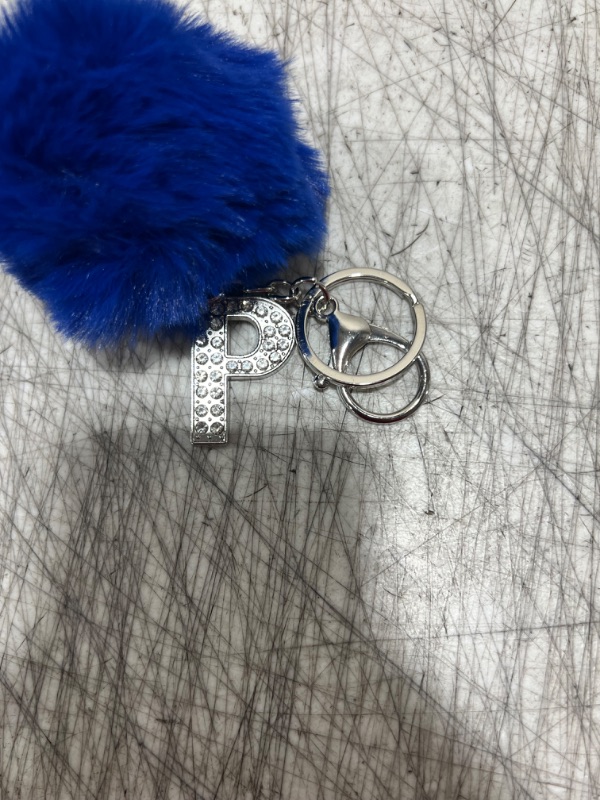 Photo 1 of Blue fluffy keychain with letter P