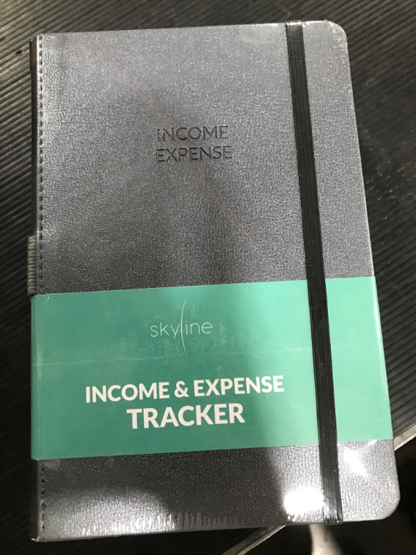 Photo 1 of Income & Expense Tracker notebook.