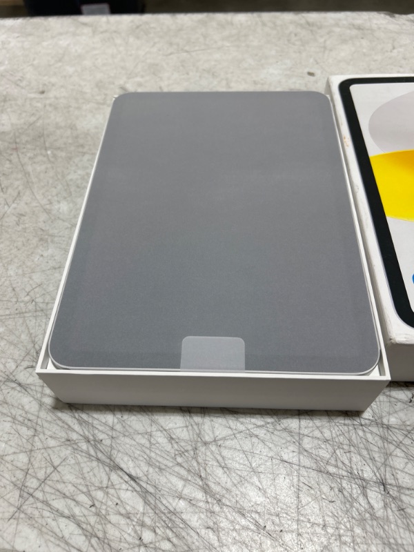 Photo 2 of Apple iPad (10th Generation): with A14 Bionic chip, 10.9-inch Liquid Retina Display, 256GB, Wi-Fi 6 + 5G Cellular, 12MP front/12MP Back Camera, Touch ID, All-Day Battery Life – Silver
