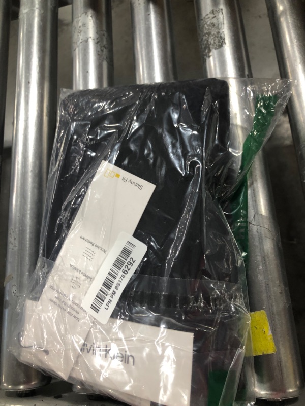 Photo 1 of Calvin Klein Skinny Fit Men’s Suit Separates with Performance Stretch Fabric, Black, 34W x 30L