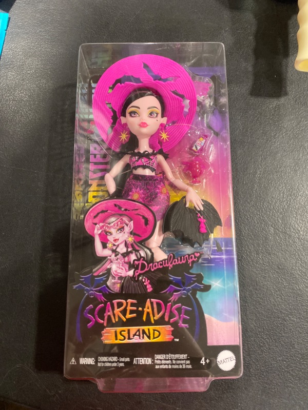 Photo 2 of Monster High Scare-adise Island Draculaura Doll with Swimsuit, Sarong and Beach Accessories Like Hat, Sunscreen, and Tote
