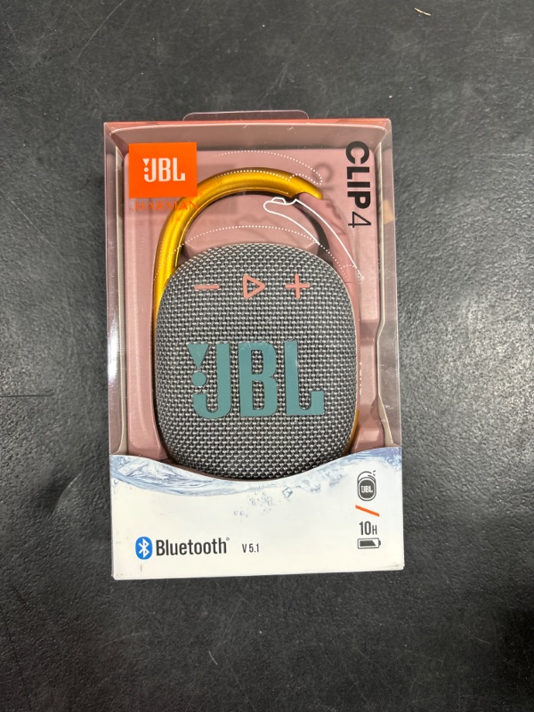 Photo 2 of JBL Clip 4 - Portable Mini Bluetooth Speaker, big audio and punchy bass, integrated carabiner, IP67 waterproof and dustproof, 10 hours of playtime, speaker for home, outdoor and travel - (Gray) Clip 4 Gray