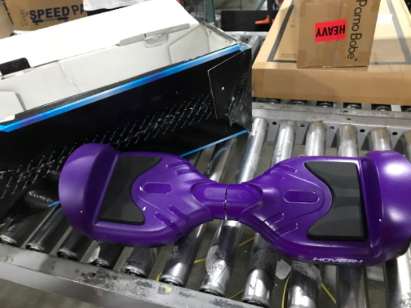 Photo 2 of Hover-1 Rocket Electric Self-Balancing Hoverboard with 6.5” LED Light-Up Wheels, Dual 160W Motors, 7 mph Max Speed, and 3 Miles Max Range Purple 1.0