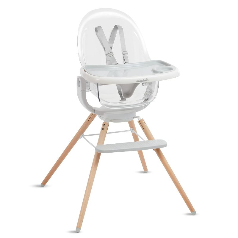 Photo 1 of Munchkin® 360° Cloud™ Baby and Toddler High Chair with Clear Seat and 360° Swivel, White and Grey with Wooden Legs
