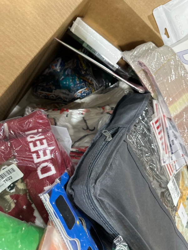 Photo 4 of Miscellaneous box containing clothes of various styles and sizes, home goods, tech goods, Etc.. Estimated total over $400, sold as is, No returns