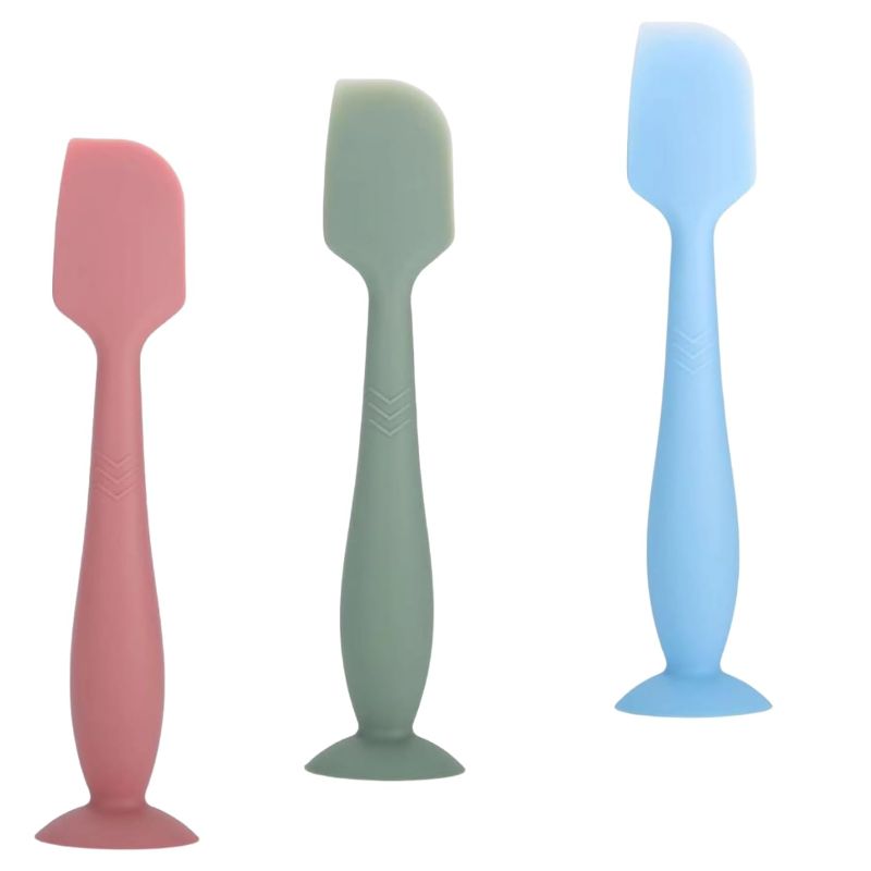 Photo 1 of YUEYUEJIA Baby Diaper Cream Spatula Applicator 3 Pack Soft Silicone Butt paste Spatula Diaper Cream Brush with Suction Cup Base (Red Green Blue.)
