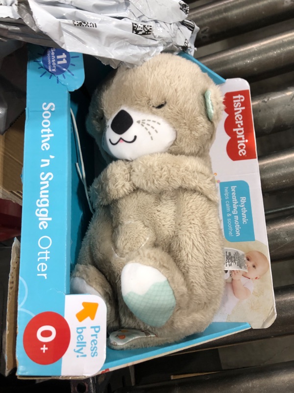 Photo 2 of Fisher-Price Sound Machine Soothe 'n Snuggle Otter Portable Plush Baby Toy with Sensory Details Music Lights & Rhythmic Breathing Motion
