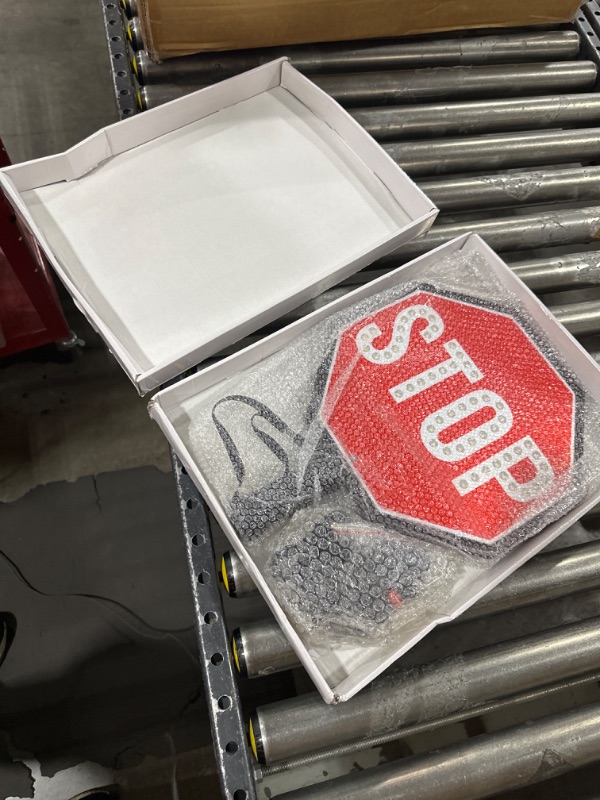 Photo 1 of SmartSign LED STOP Paddle - Reflective Hand Held Stop Sign with Handle, 18" Double-Sided, Steady/Flashing LED Light Modes, Rechargeable, Foam-Padded Grip, Red, Pack of 1 18" x 18"
