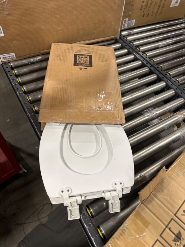 Photo 2 of MAYFAIR 1888SLOW 000 NextStep2 Toilet Seat with Built-In Potty Training Seat, Slow-Close, Removable that will Never Loosen, ELONGATED, White White Elongated Toilet Seat