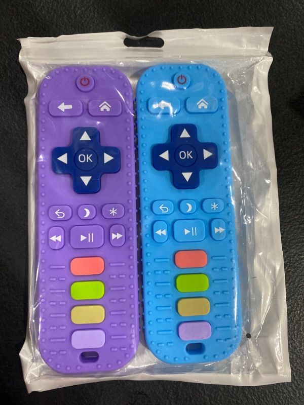 Photo 2 of Baby Teething Toys, Silicone Teething Toys for Toddlers Teether Toys for Babies 6-12 Months,Remote Control Teething Toys for Baby 0-6 Months, Infant Baby Teether Toys BPA Free  PURPLE AND BLUE
