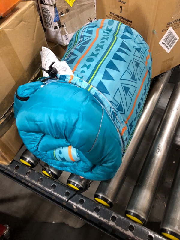 Photo 2 of Coleman Kids 50°F Sleeping Bag, Comfortable Youth Sleeping Bag for Sleepovers & Camping, Fits Children up to 5ft Tall, Glow in The Dark Design, Stuff Sack Included, Machine Washable Teal Pfas-free