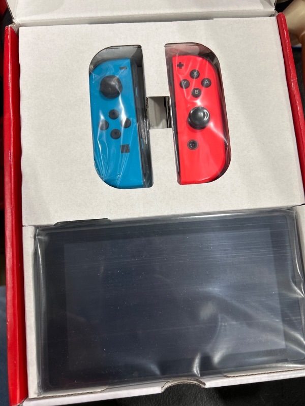 Photo 2 of Nintendo Switch™ with Neon Blue and Neon Red Joy?Con™ Console Neon