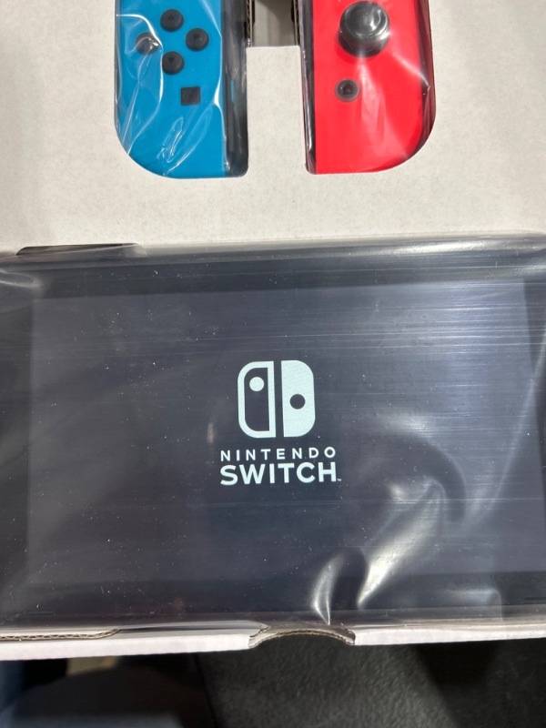 Photo 4 of Nintendo Switch™ with Neon Blue and Neon Red Joy?Con™ Console Neon
