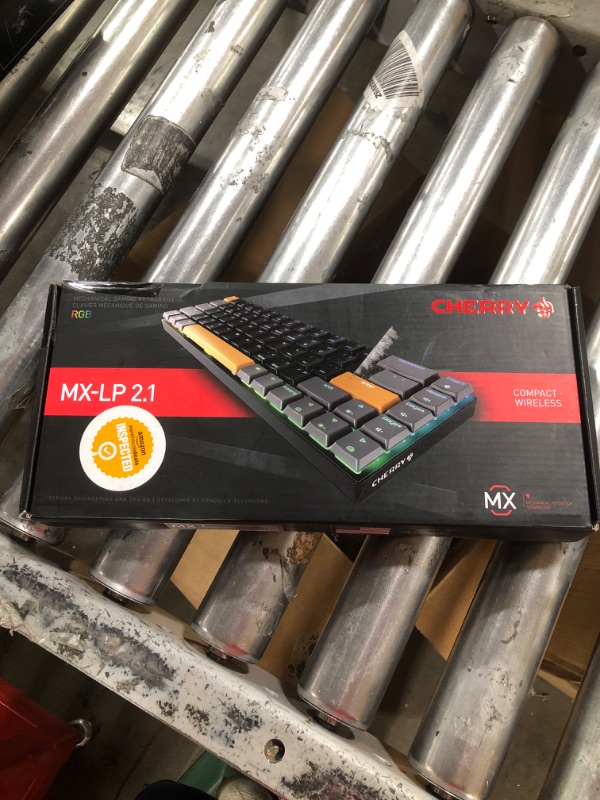 Photo 3 of Cherry MX-LP 2.1 Compact Wireless Gaming Keyboard. RGB MX Silver Speed Switches. RGB Lighting Low-Profile MX Precision switches. 65% Size. 68 Keys. (Black & Orange)
