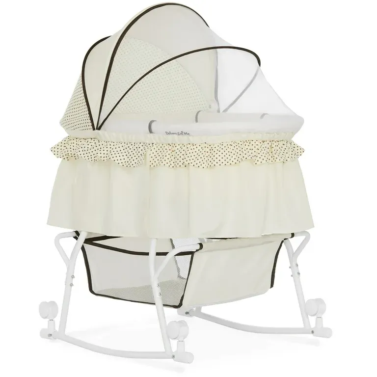 Photo 1 of Dream On Me Lacy Portable 2-in-1 Bassinet & Cradle in Cream, Lightweight Baby Bassinet
