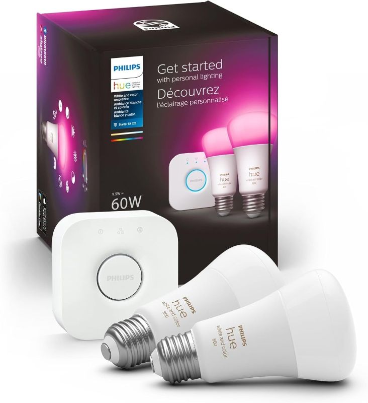 Photo 1 of Philips Hue Smart Light Starter Kit - Includes (1) Bridge and (2) 60W A19 LED Bulb, White and Color Ambiance Color-Changing Light, 800LM, E26 - Control with App or Voice Assistant
