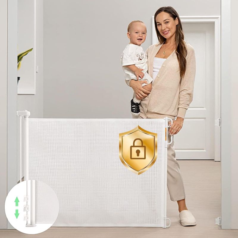 Photo 1 of Retractable Baby Gate, Momcozy Mesh Baby Gate or Mesh Dog Gate, 33" Tall,Extends up to 55" Wide, Child Safety Gate for Doorways, Stairs, Hallways, Indoor/Outdoor
