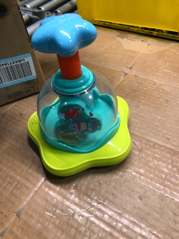 Photo 1 of Bright Starts Press & Glow Spinner Cause and Effect Musical Baby Toy, Age 6 Months+ Press & Grow
