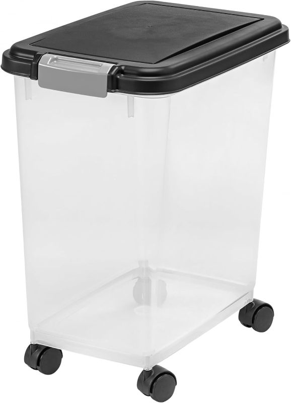 Photo 1 of ***BROKEN LID*** 

IRIS USA 25 Lbs / 33 Qt WeatherPro Airtight Pet Food Storage Container with Attachable Casters, For Dog Cat Bird and Other Pet Food Storage Bin, Keep Fresh, Translucent Body, Easy Mobility, Black