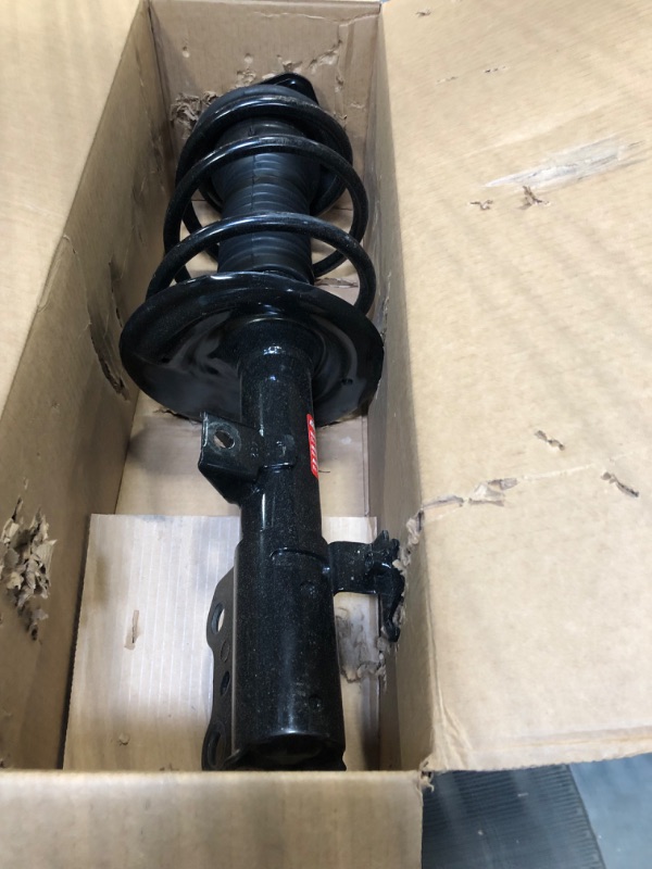 Photo 1 of Monroe Shocks & Struts Quick-Strut 173013 Strut and Coil Spring Assembly
