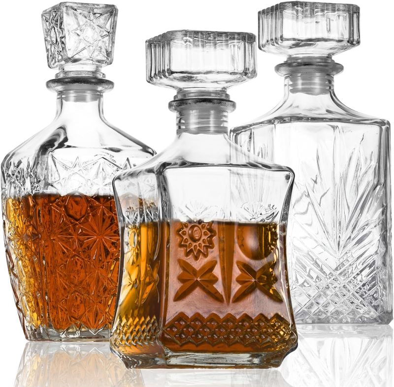Photo 1 of 
LAWADACH Liquor Decanters Whiskey Decanter Set of 3 Glass Alcohol Bottle for Tequila, Brandy and Vodka Unique Liquor Bar and Party Decorations (28oz*2, 31oz*1)
