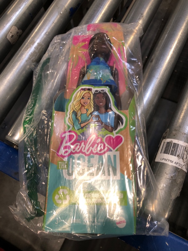 Photo 1 of Barbie Loves The Ocean Beach-Themed Doll (11.5-inch Brunette)