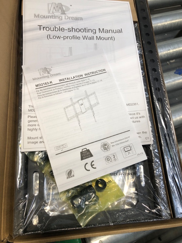 Photo 1 of Mounting Dream TV Mount Fixed for Most 42-70 Inch Flat Screen TVs, UL Listed TV Wall Mount Bracket up to VESA 600 x 400mm and 132 lbs - Fits 16"/18"/24" Studs - Low Profile and Space Saving MD2163-K