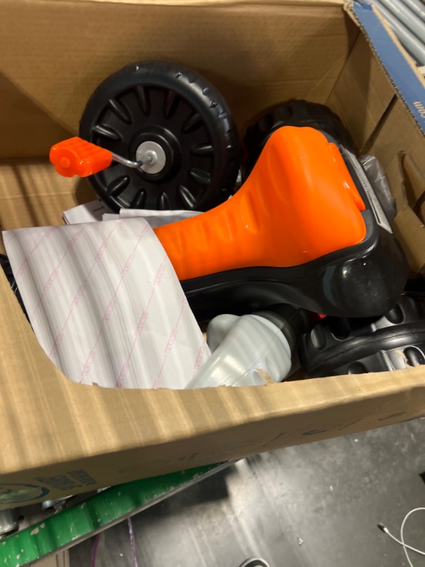 Photo 3 of Fisher-Price Harley-Davidson Tricycle with Handlebar Grips and Storage Area, Multi-Terrain Tires, Tough Trike [Amazon Exclusive]