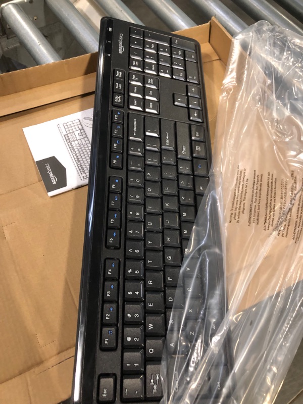 Photo 3 of Amazon Basics Wireless Computer Keyboard and Mouse Combo - Quiet and Compact - US Layout (QWERTY)