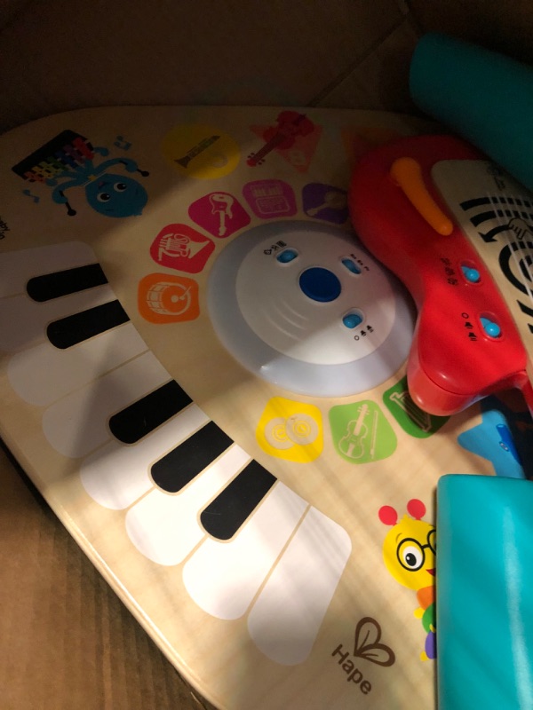 Photo 2 of Baby Einstein Together in Tune Piano & Guitar Bundle, Safe Wireless Wooden Musical Toddler Toys, Magic Touch, 6 Months+ Connected Guitar & Piano Gift Set