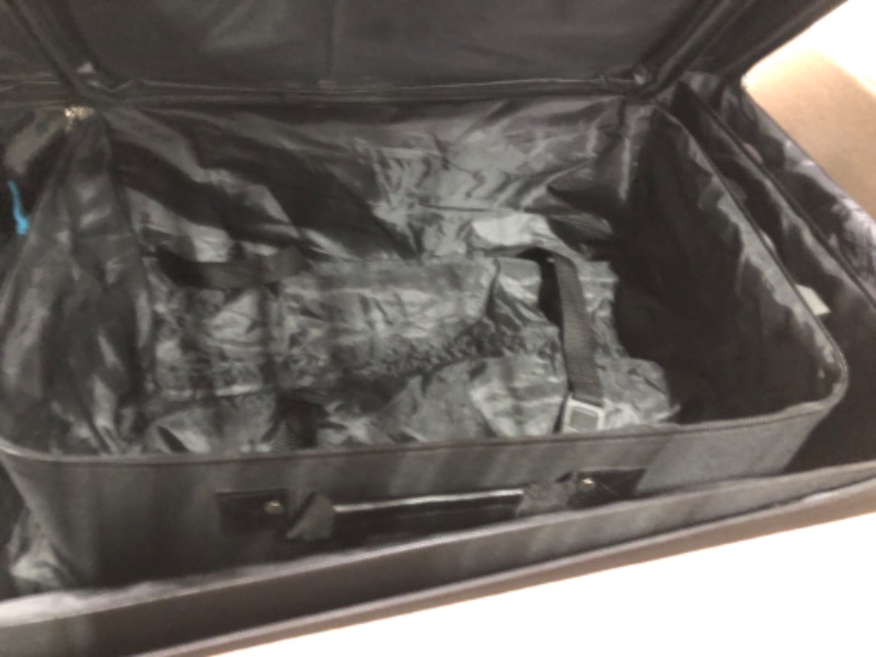 Photo 3 of ***MISSING SMALL ROLLING BAG*** *** LARGE LUGGAGE HAS DAMAGED FABRIC** 

Rockland Journey Softside Upright Luggage Set, Black, 4-Piece (14/19/24/28) 4-Piece Set (14/19/24/28) Black