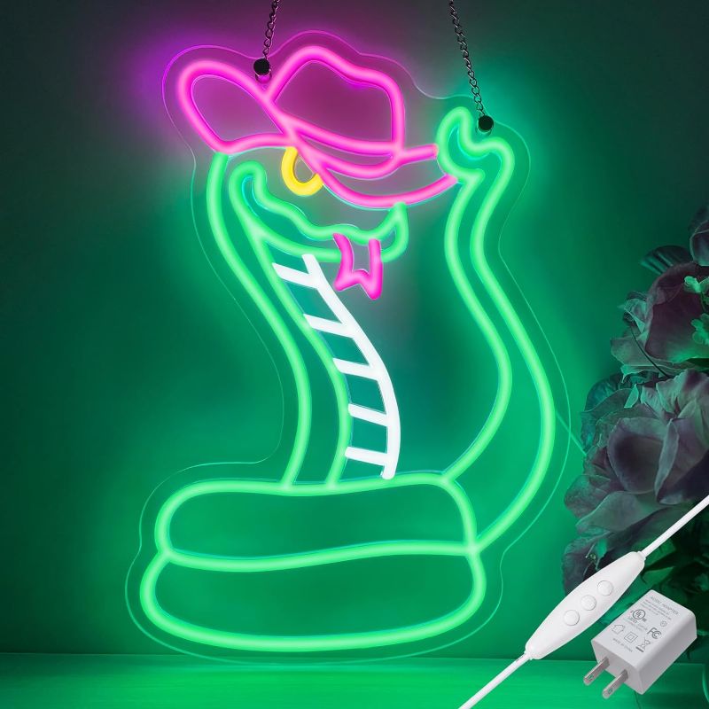 Photo 1 of ENSHUI Cowboy Snake Neon Sign for Wall Decor with Adapter Snake Wearing Cowboy Hat Dimmable Western LED Neon Lights for Bedroom Kids Room Bar Girl's Christmas Gift 15.8 x 14.3 Inch(Green)
