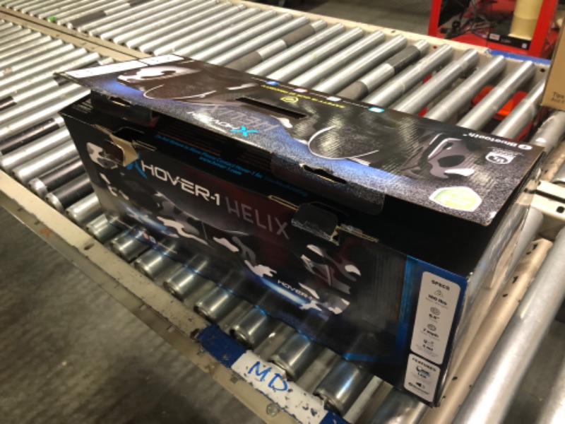 Photo 2 of **FOR PARTS** Hover-1 Helix Electric Hoverboard | 7MPH Top Speed, 4 Mile Range, 6HR Full-Charge, Built-in Bluetooth Speaker, Rider Modes: Beginner to Expert Hoverboard Camo