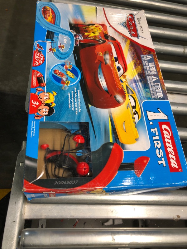 Photo 2 of Carrera First Disney/Pixar Cars - Slot Car Race Track - Includes 2 Cars: Lightning McQueen and Dinoco Cruz - Battery-Powered Beginner Racing Set for Kids Ages 3 Years and Up Disney Cars w/ Spinners