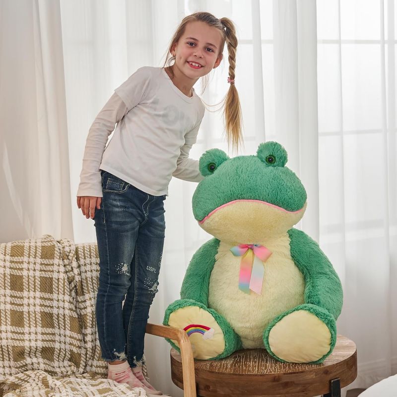 Photo 1 of Giant Frog Stuffed Animal 26.7 Inch (Sitting Height), Large Stuffed Frog Plush for Boy Girl Girlfriend, Big Green Plush Frog Valentine's Day Birthday Gift with Rainbow Embroidery Bow Tie
