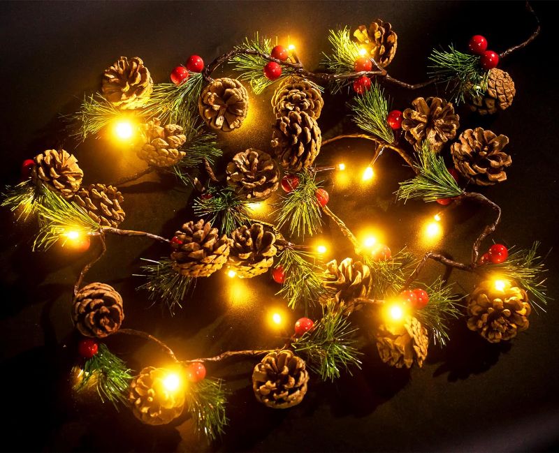 Photo 1 of  Christmas Garland with Lights and Bigger Pine Cones, Led String Lights, Red Berries, Needle, Pine Cone, Xmas Wreath, Christmas Lights for Indoor Decorations, Fireplace, 6.6 FT, 20 Led
