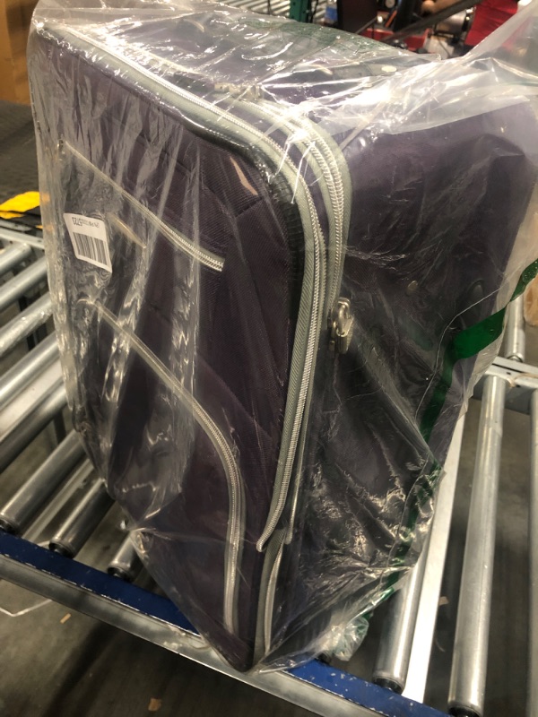 Photo 1 of 14" x 20" x 8" purple roller luggage
