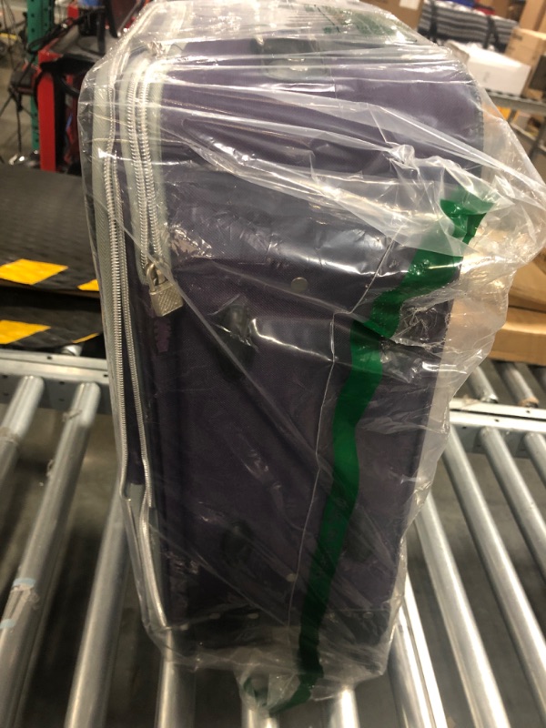 Photo 2 of 14" x 20" x 8" purple roller luggage