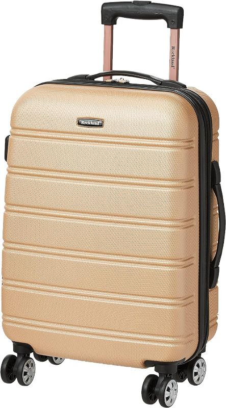 Photo 1 of  Rockland luggage Rockland Melbourne Hard side Expandable Spinner Wheel Luggage, Champagne, Carry-On 20-Inch 20x16 10"